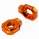 ZETA Napinacz osi 25mm tylnego koła Axle Block tył KTM HUSQVARNA GAS GAS pomarańcz